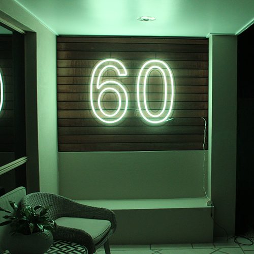 60 Neon sign mounted 2